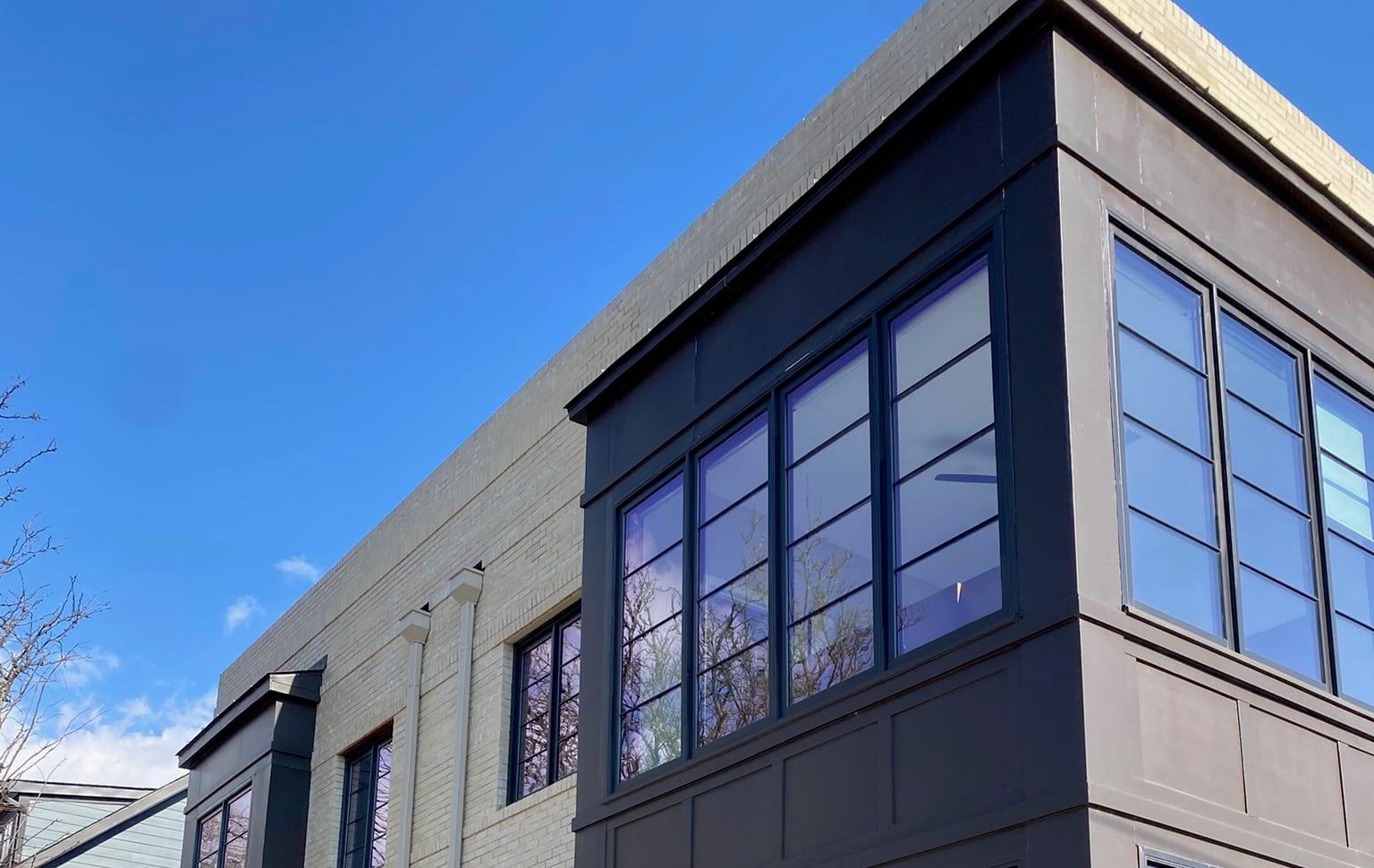 Modern black-paneled architecture representative of West End Alexandria's newer construction