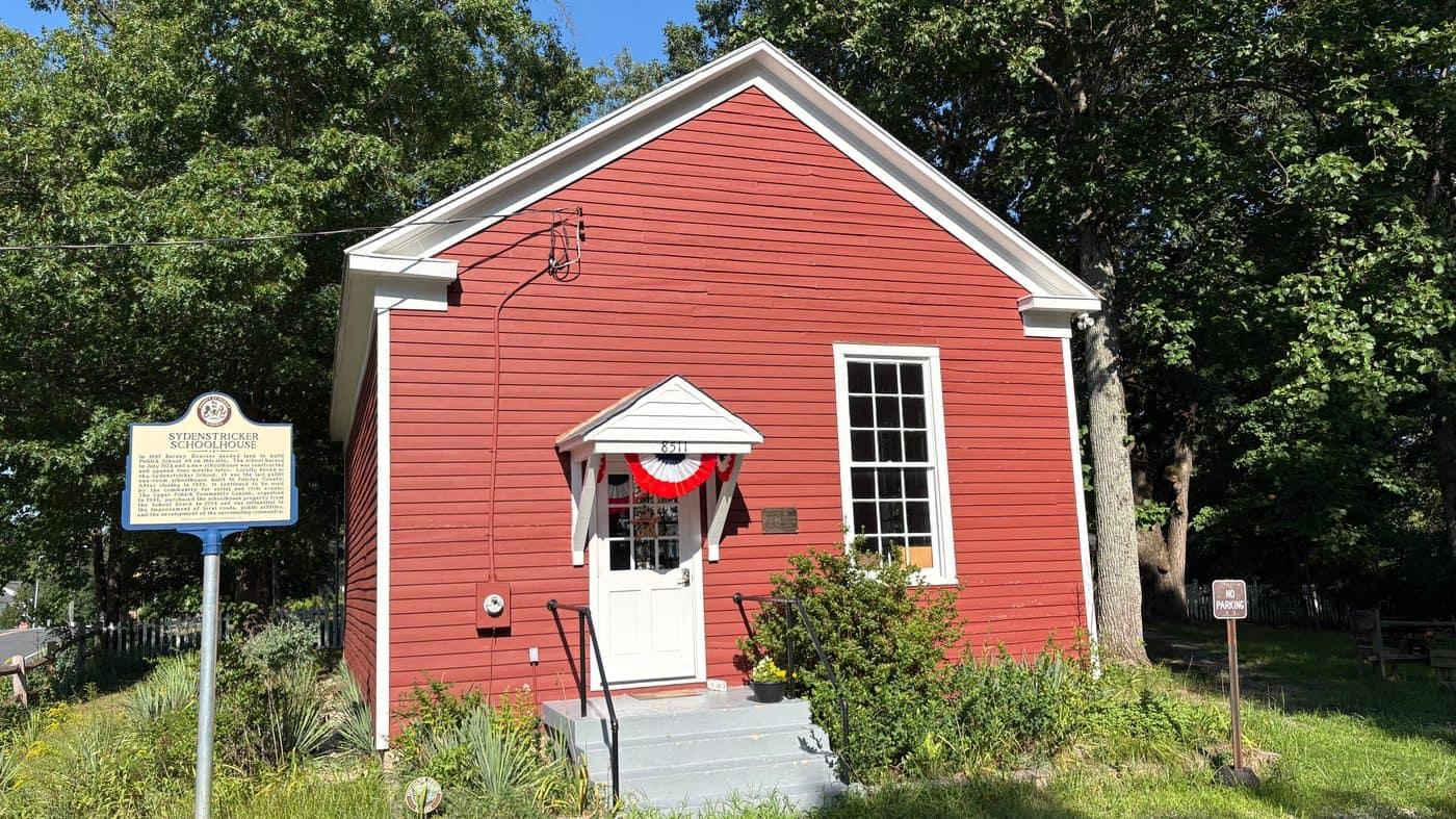 The Sydenstricker Schoolhouse, a red one-room schoolhouse built in 1928 and listed on the National Register of Historic Places